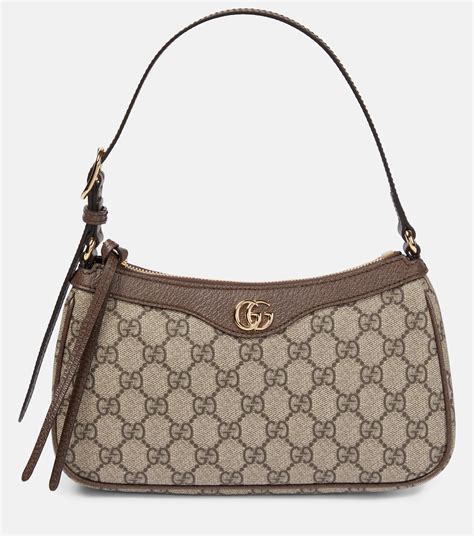 gucci gg supreme shoulder bag|Gucci ophidia clear bag.